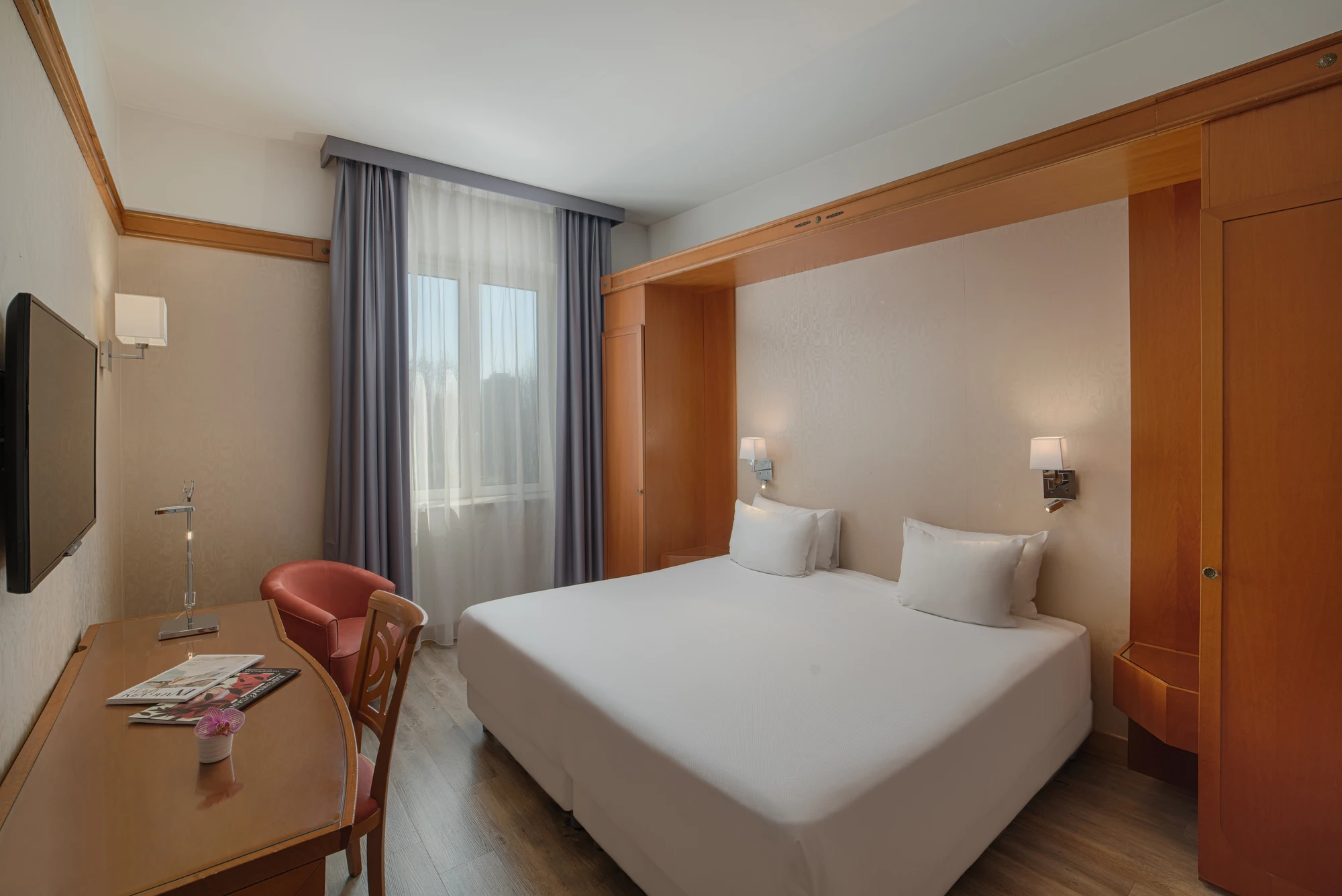 NH Ravenna Hotel Ansicht auf das gemütliche Zimmer-in Klassischen Farben